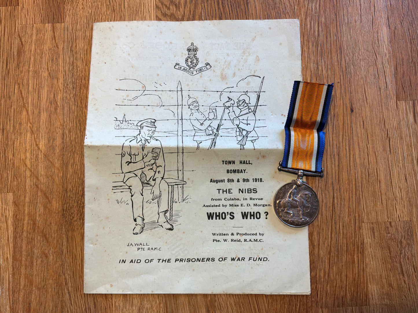 WW1 War medal & Bombay Town hall concert party program to same person.
