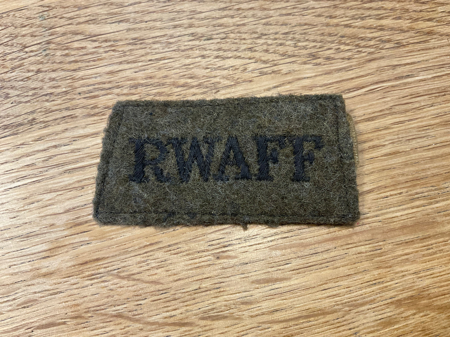 WW2 R.W.A.F.F cloth slip on shoulder title.