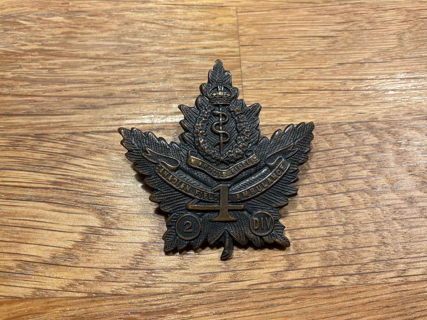 WW1 CEF 4th Canadian Field Ambulance cap badge.