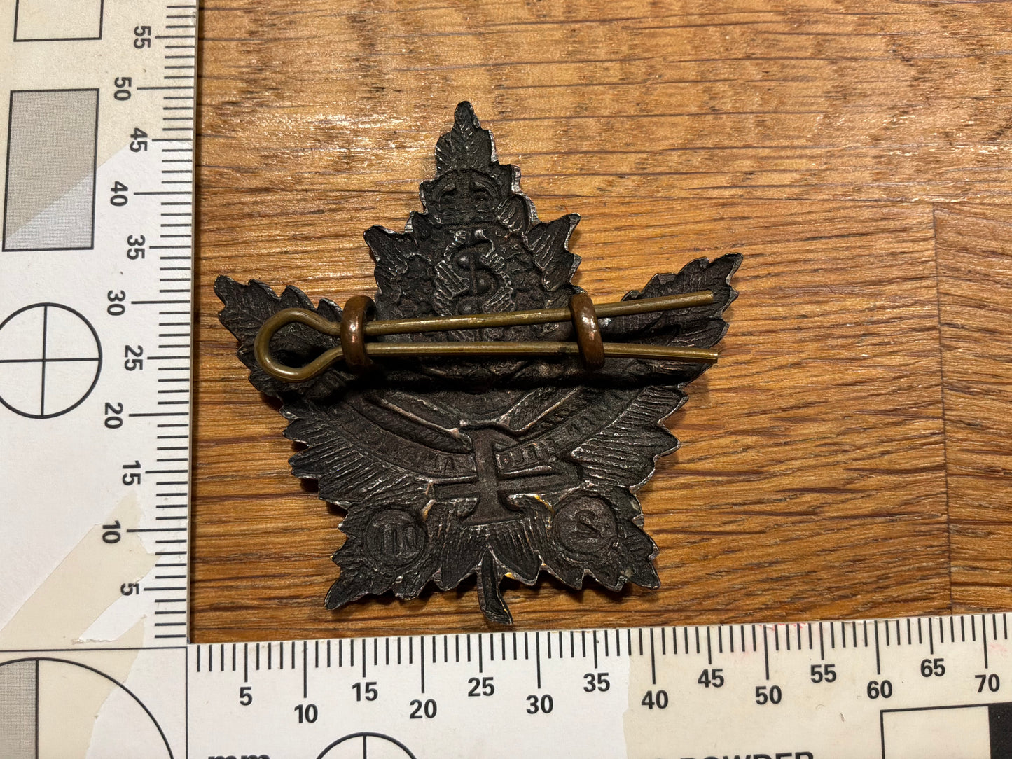WW1 CEF 4th Canadian Field Ambulance cap badge.