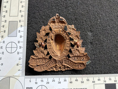 K/C Royal Canadian Mounted Police (RCMP) cap badge.