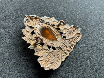 K/C Royal Canadian Mounted Police (RCMP) cap badge.