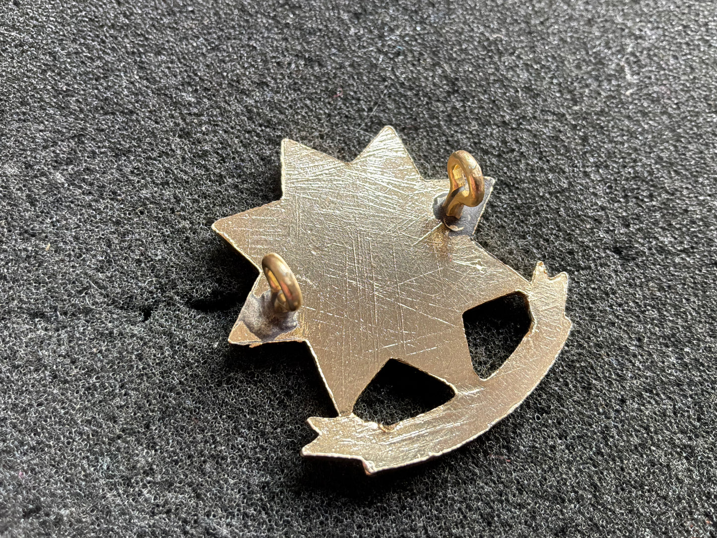 Kenyan Army Transport/ Logistics corps anodised cap badge.