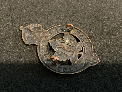 WW1 C.E.F 11th Battalion Garrison Regiment Officers cap badge.