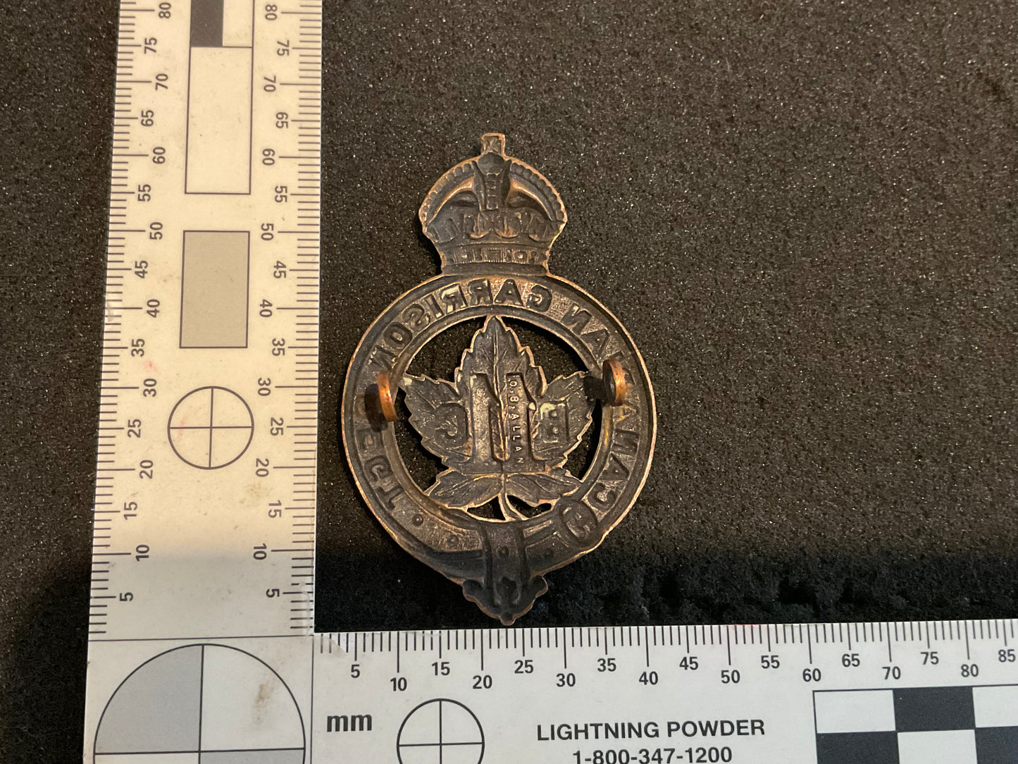 WW1 C.E.F 11th Battalion Garrison Regiment Officers cap badge.