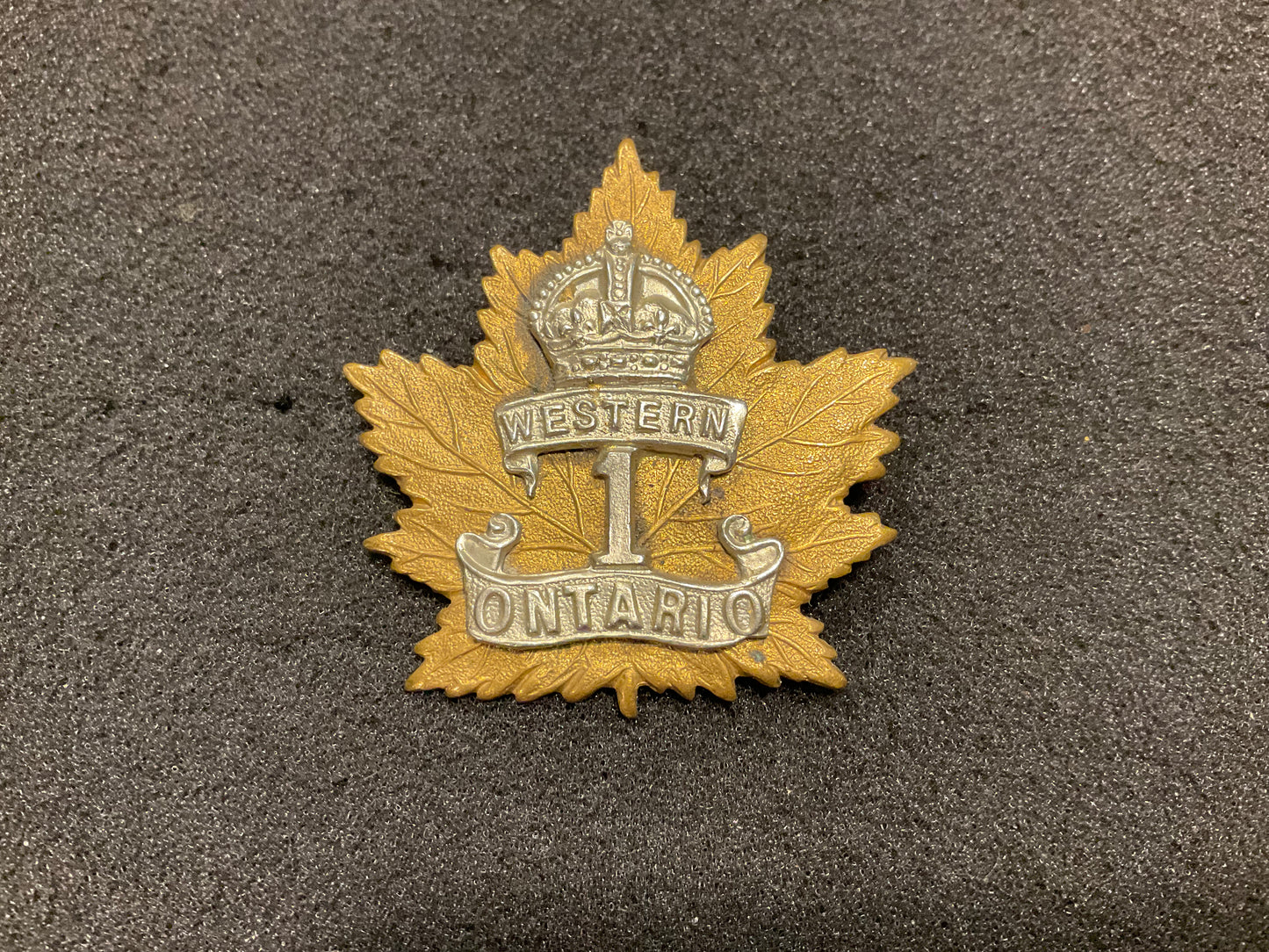 WW1 C.E.F 1st Western Ontario Regiment cap badge by TIPTAFT.