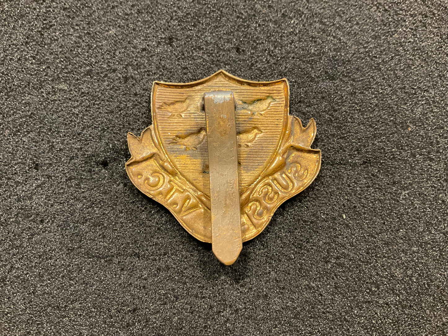 WW1 Sussex V.T.C Brass cap badge.