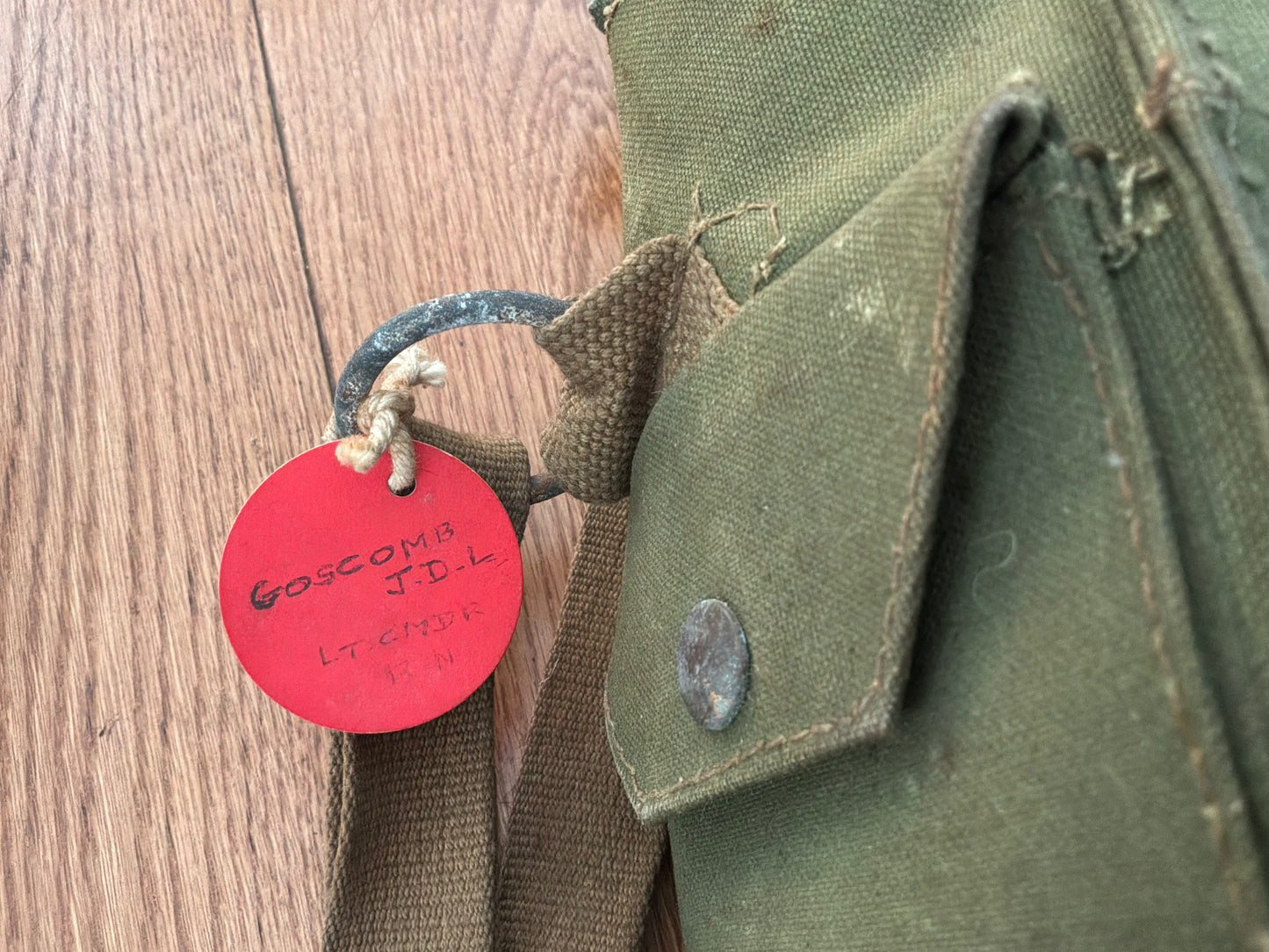 1943 dated Light Weight respirator issued to R.N Submariner John GOSCOMBE.