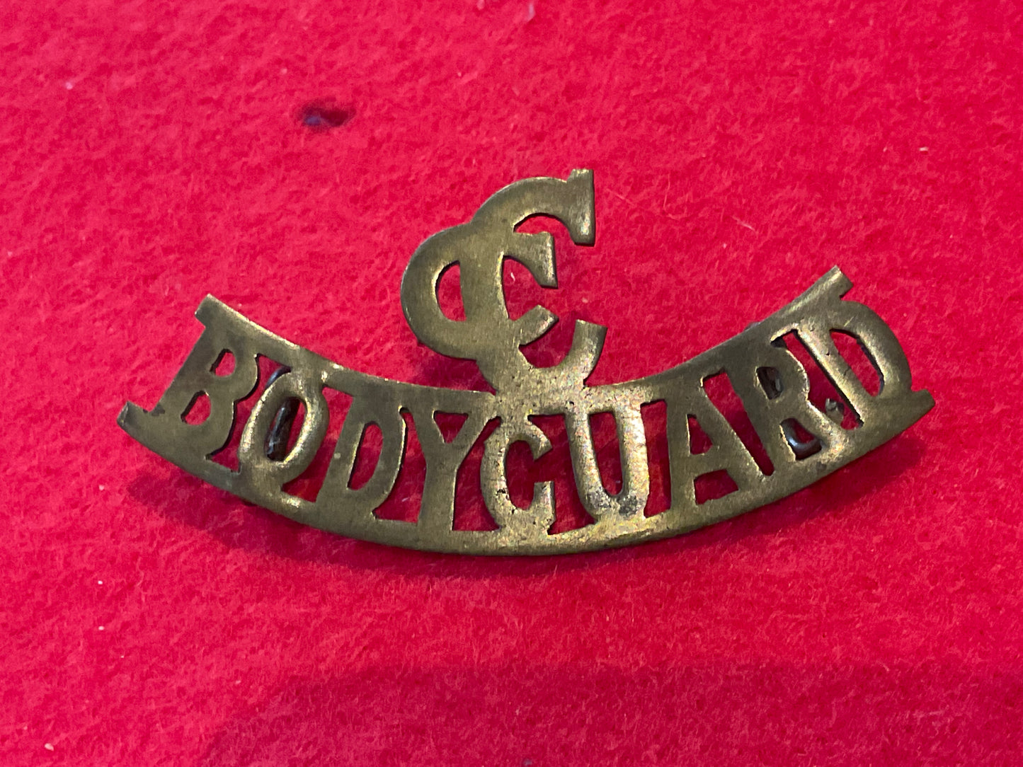 Boer War Commander in Chief’s Bodyguard brass shoulder title With brass wire loops.