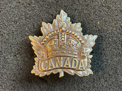 WW1 CEF 1914 dated General Service cap badge made by P.W ELLIS & CO