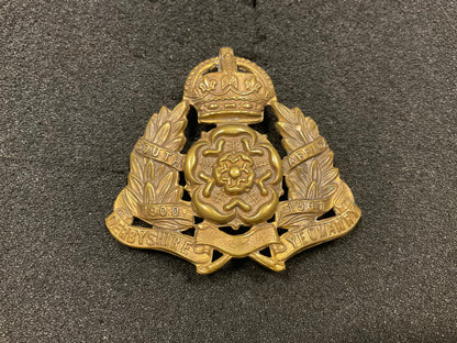Derbyshire Yeomanry cap badge with blank scroll