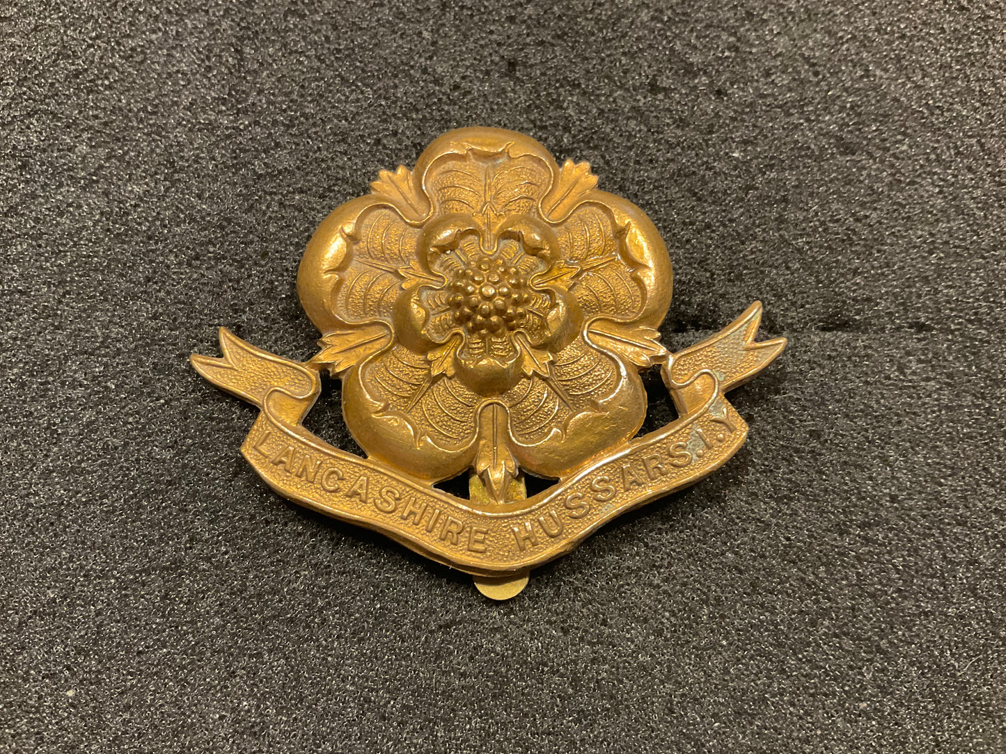 Lancashire Hussars Imperial Yeomanry cap badge 1903-08 slider version.