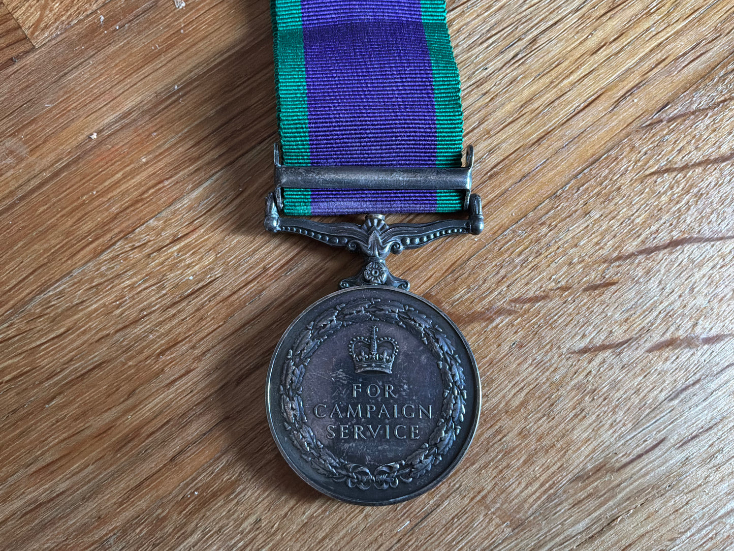 G.S.M with BORNEO bar, correctly marked on rim 23673895 GNR. B.G.C BAKER R.A