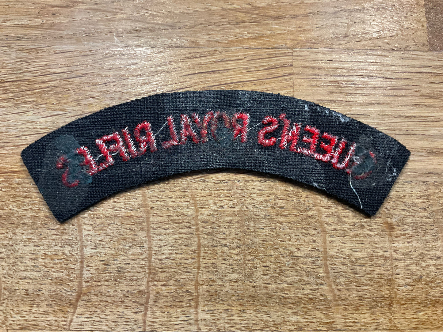 Queens Royal Rifles (1961-67) Red letters on Rifle green cloth title.