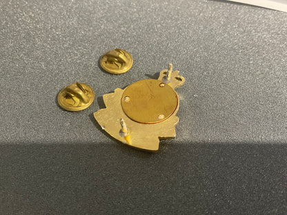 Anodised NZ Ordnance corps collar badge.