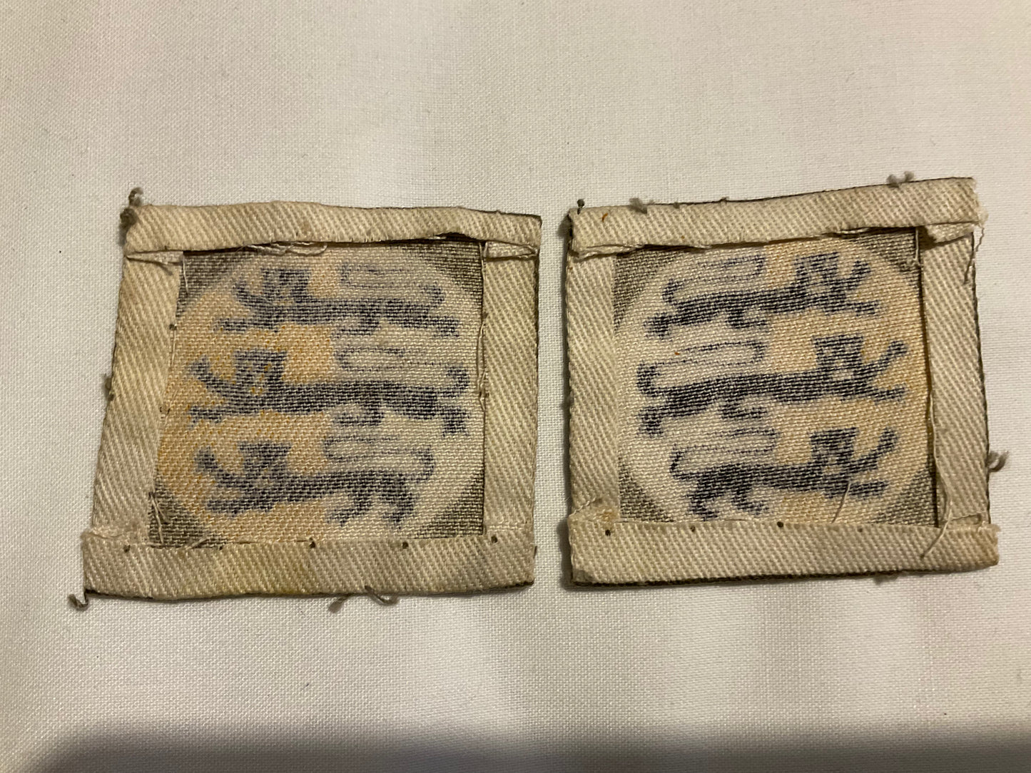WW2 Dorset County Division printed formation signs, matching facing pair.