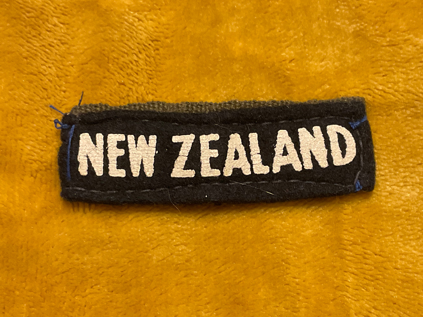WWII New Zealand Topical Cloth Slip on Shoulder Title