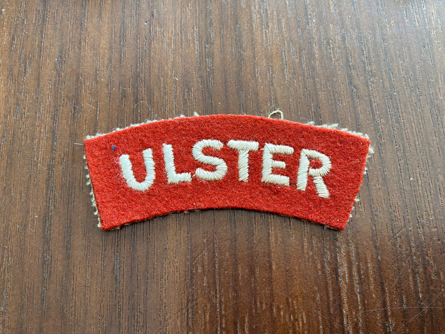 Rare WRAC ‘ULSTER’ terracotta brown wool shoulder title.