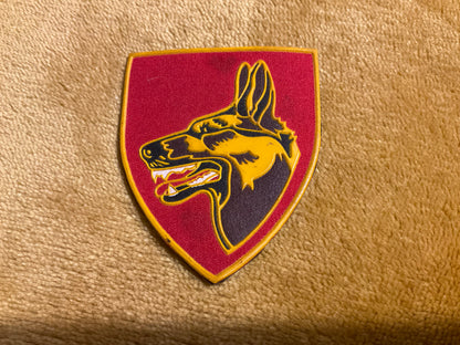 South African Army Dog (K9) Centre rubberised beret badge.