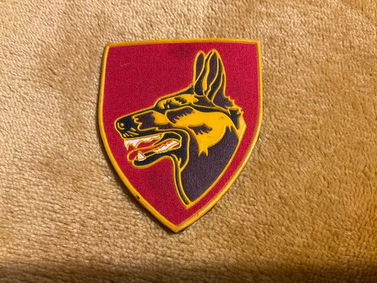 South African Army Dog (K9) Centre rubberised beret badge.