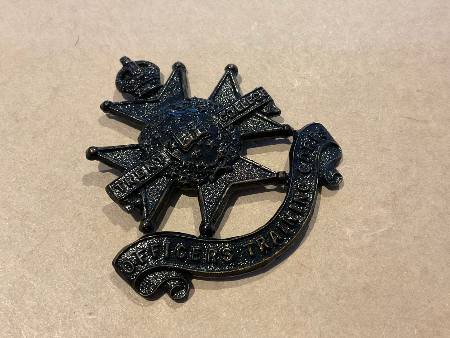 Trent College Officers Training Corps (OTC) cap badge.
