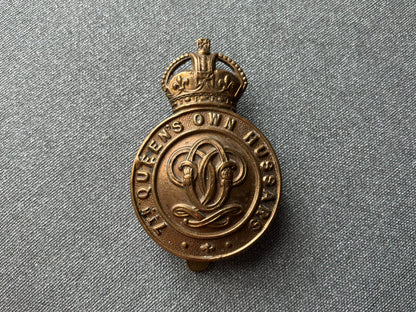 WW1 Economy brass 7th Queens Own Hussars cap badge.