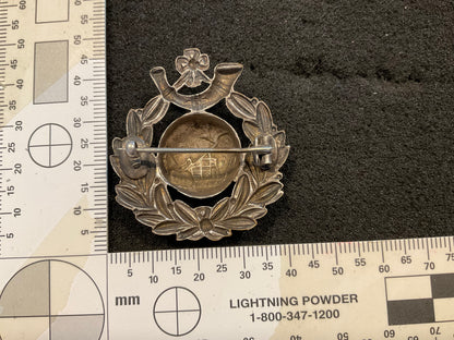 WW1 R.M.L.I Silver plated broached cap badge