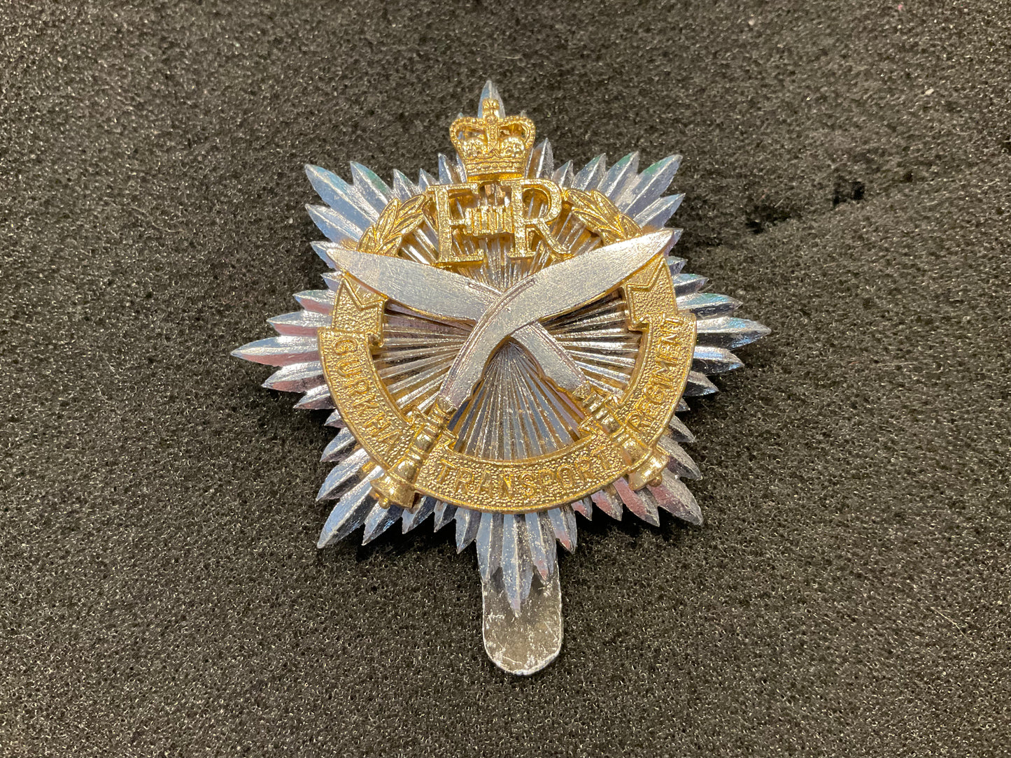 Anodised Gurkha Transport Regiment cap badge.