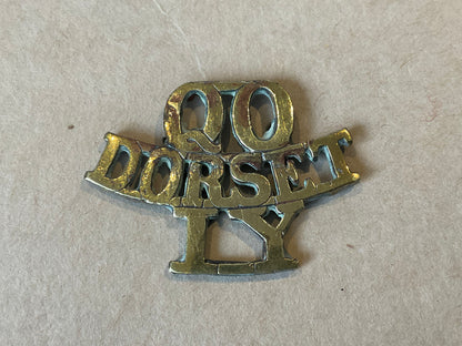 Queen's Own Dorset Imperial Yeomanry brass shoulder title.