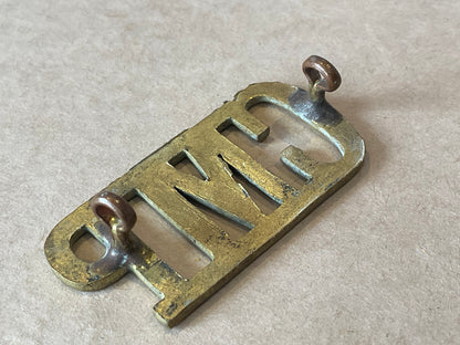 WW1/2 C.M.P (Corps of Military Police) brass shoulder title.