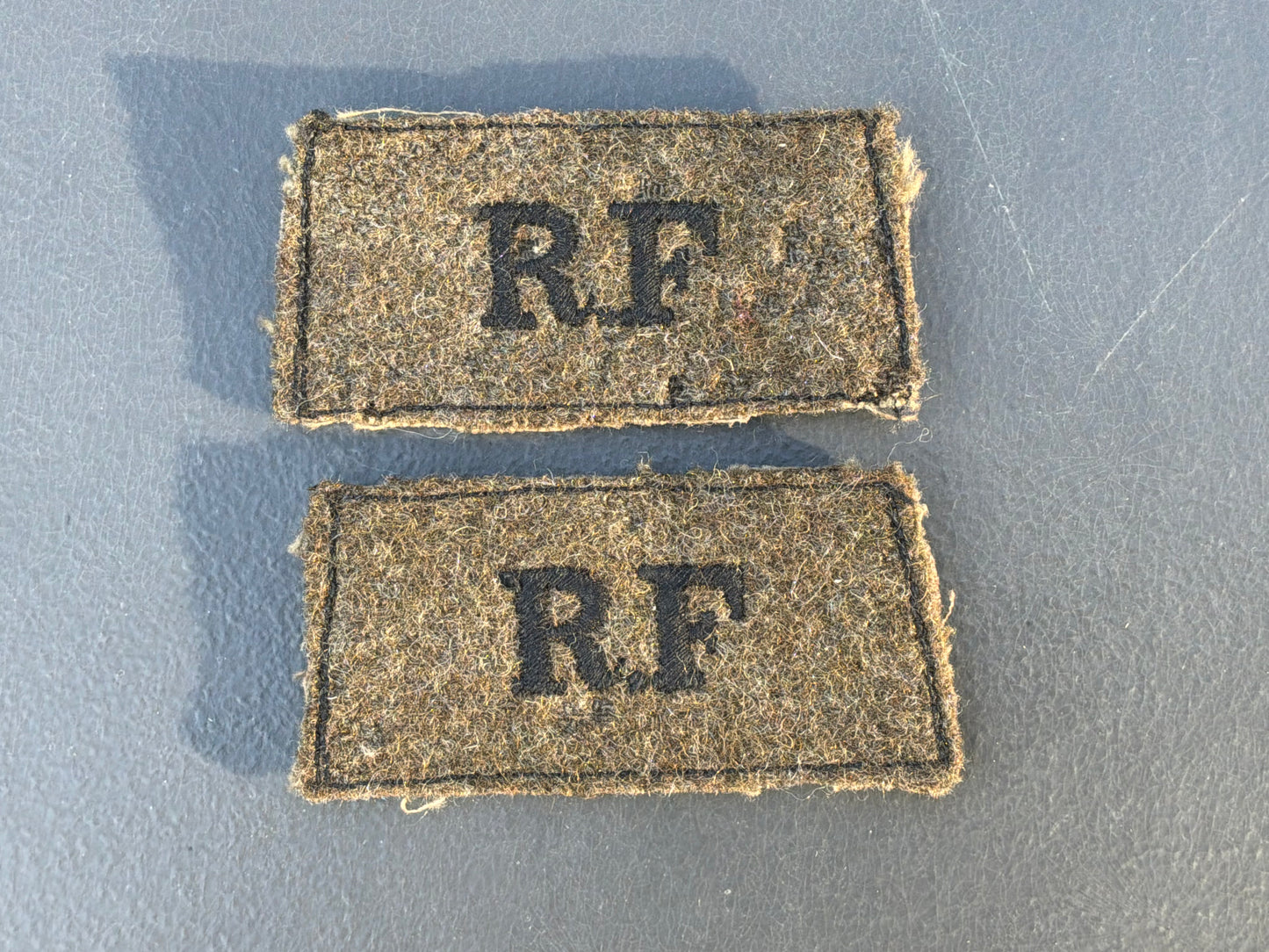 WW2 R.F (Royal Fusiliers) cloth slip-on titles.