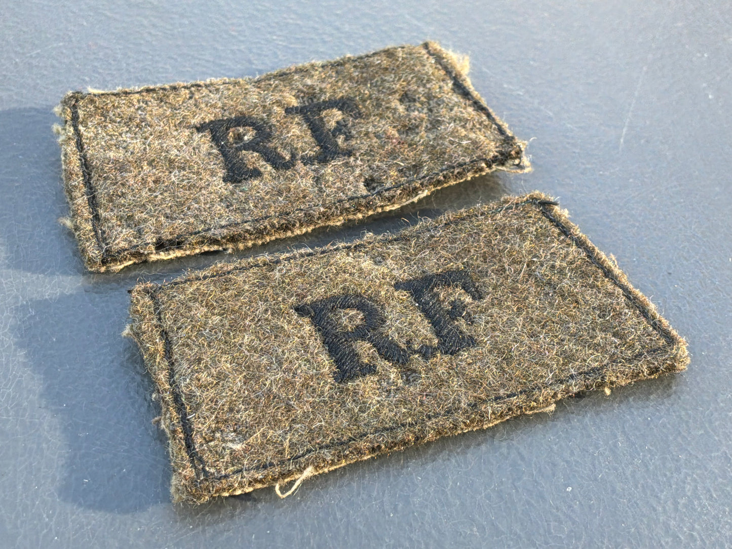 WW2 R.F (Royal Fusiliers) cloth slip-on titles.