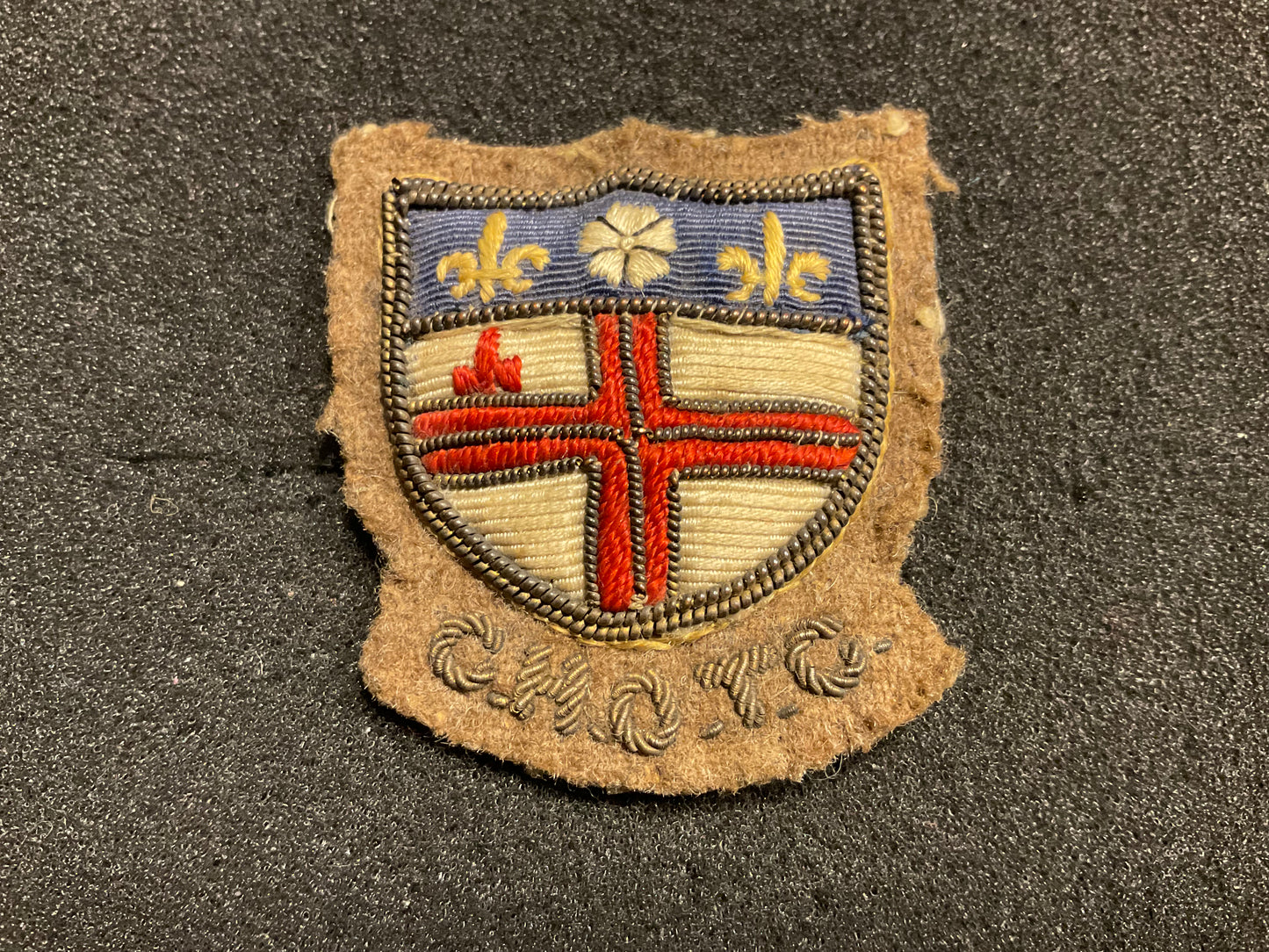 Embroidered Christ’s Hospital Officer Training Corps (CH OTC) badge.