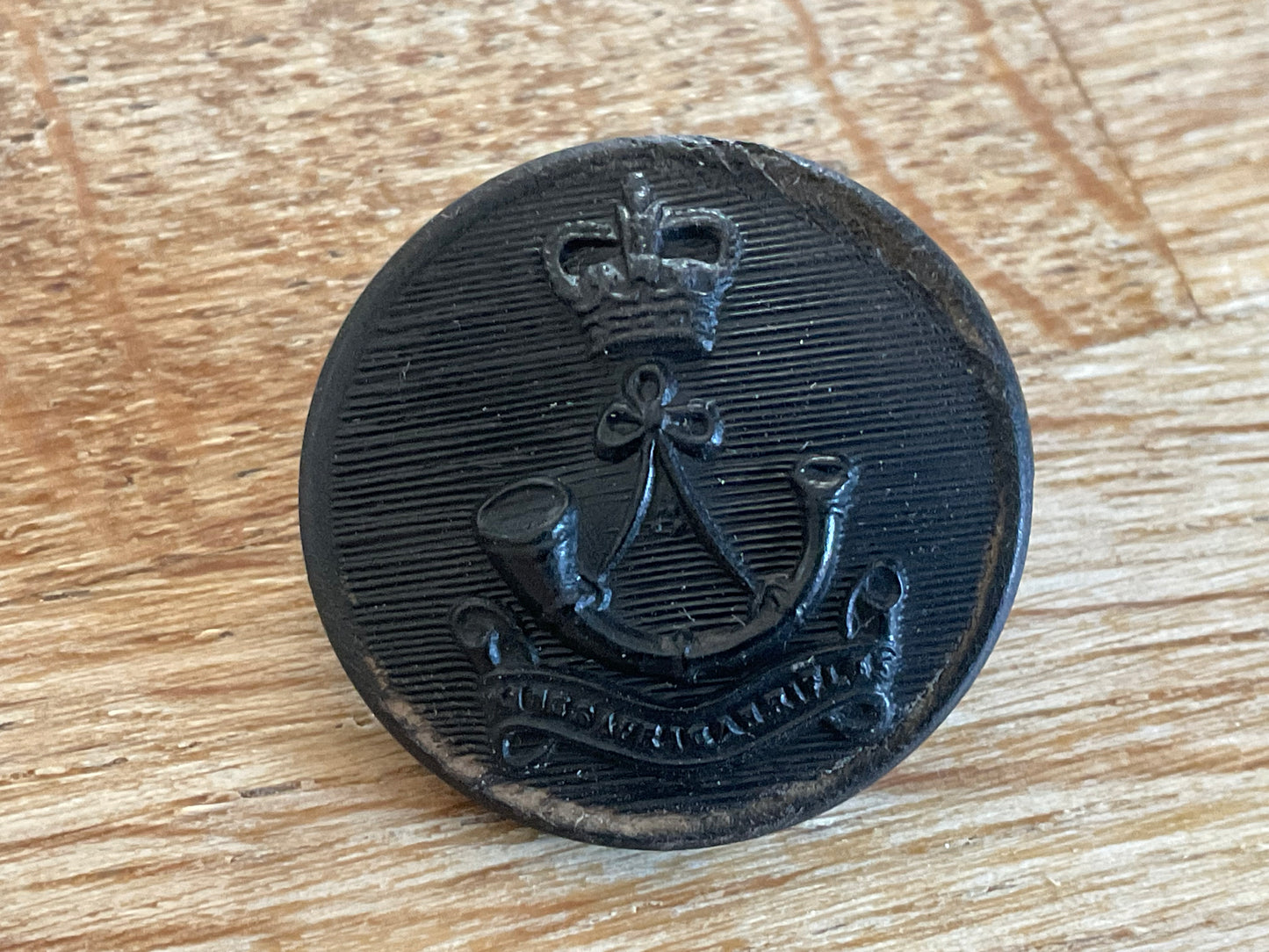 Post 1952 Kings African Rifles black horn button.