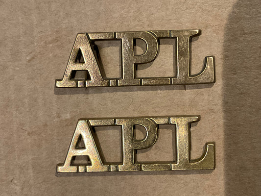 APL (Aden Protectorate Levies) brass shoulder titles