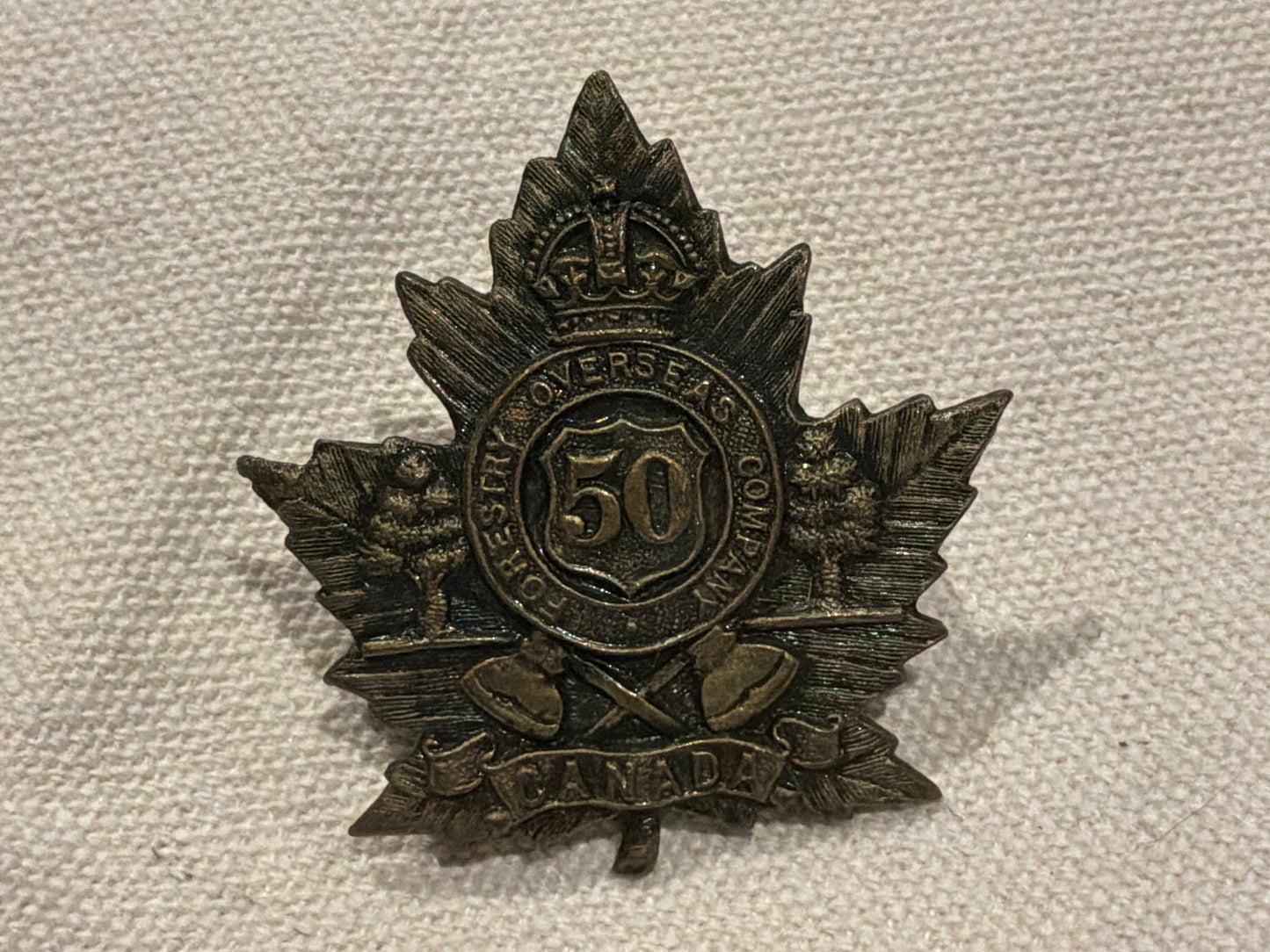 WW1 C.E.F 50th Canadian Forestry Corps Cap Badge
