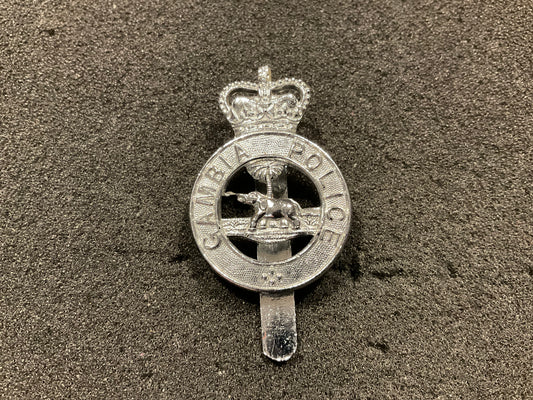 Pre 1967 Gambia Police cap badge by DOWLER.