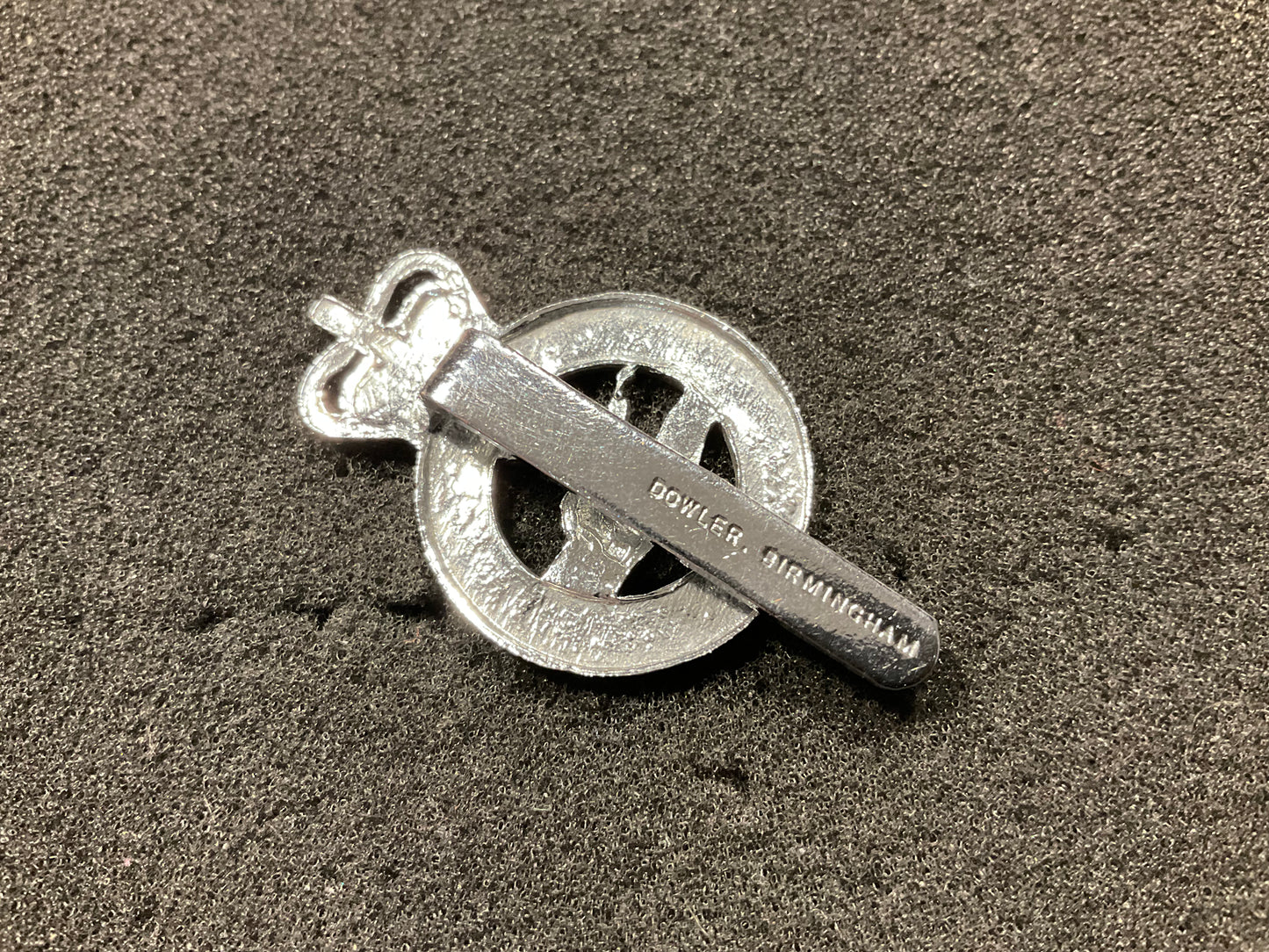 Pre 1967 Gambia Police cap badge by DOWLER.