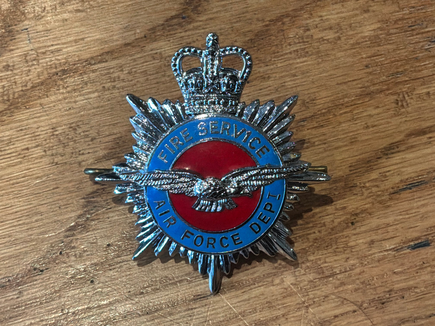 Air Force Department Fire Department cap badge.