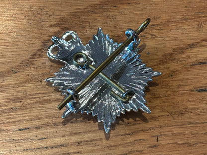 Air Force Department Fire Department cap badge.