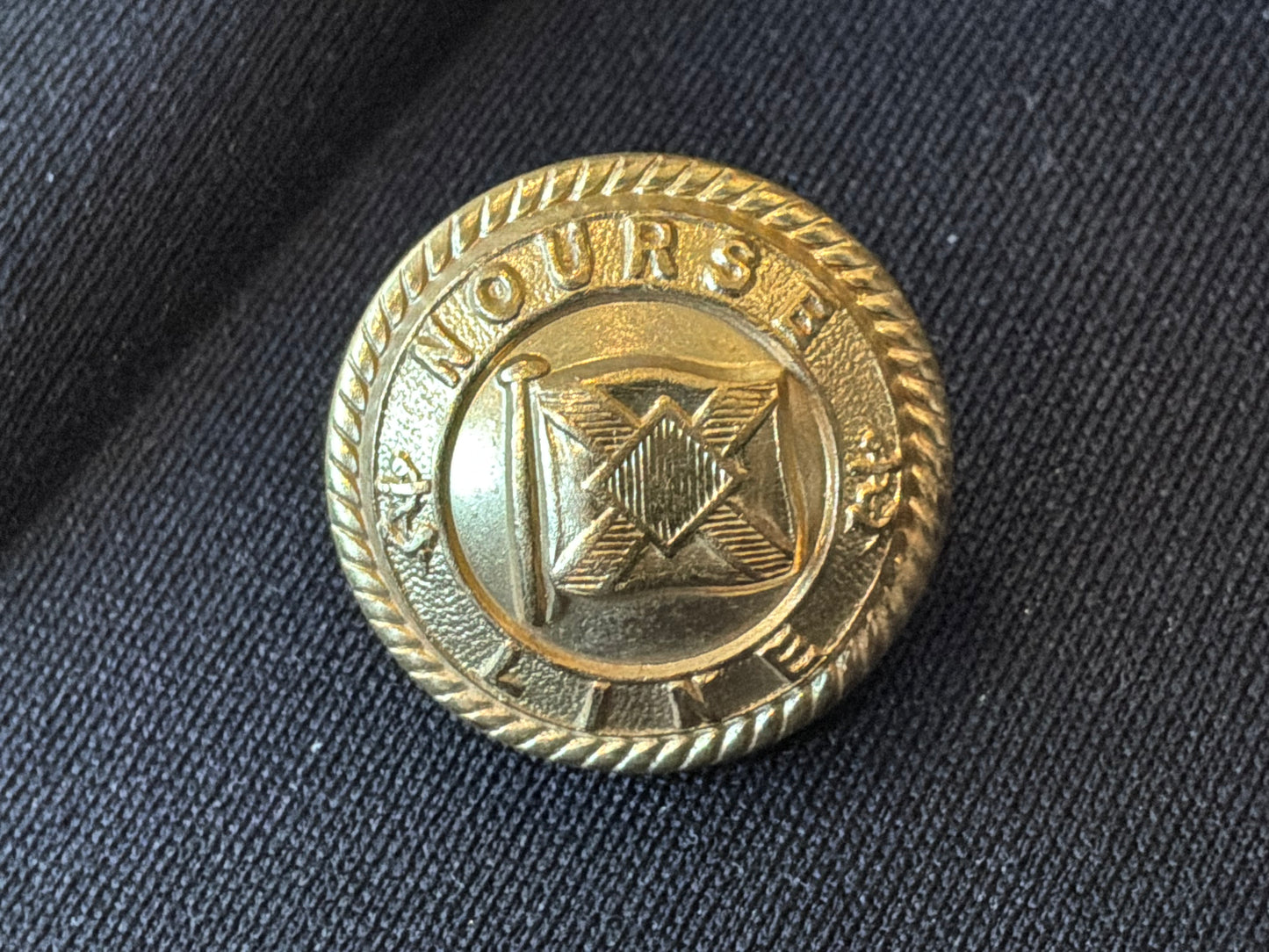 Early NOURSE LINE (Shipping Line) gilded brass button.