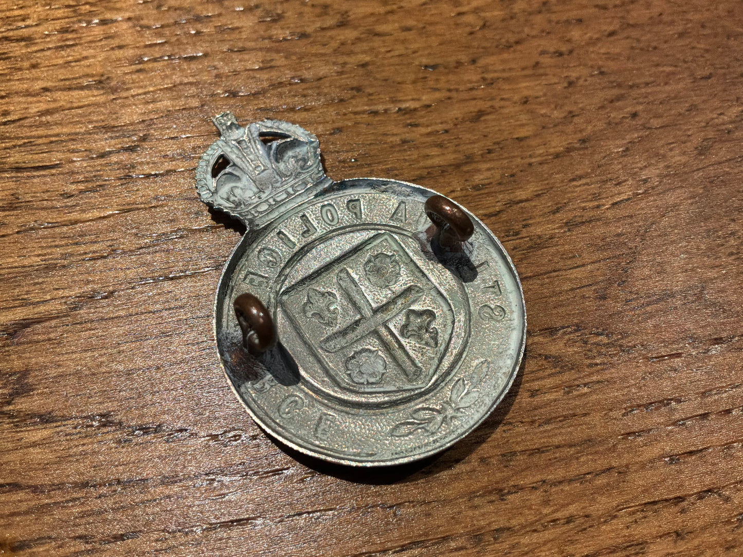 Pre 1952 K/C St Lucia Police w/m cap badge.