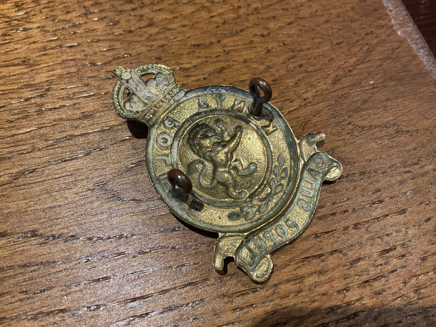 K/C Kenya Police 1st issue non-voided brass cap badge