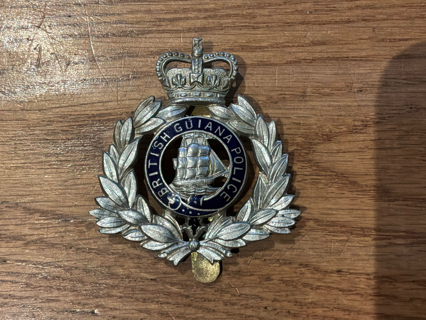 British Guiana Police cap badge by Dowler.Cica 1952-66