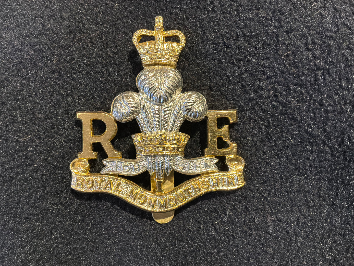 Anodised Royal Monmouthshire Royal Engineers (Militia) (TA) cap badge.