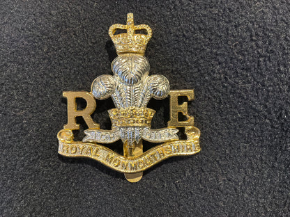 Anodised Royal Monmouthshire Royal Engineers (Militia) (TA) cap badge.