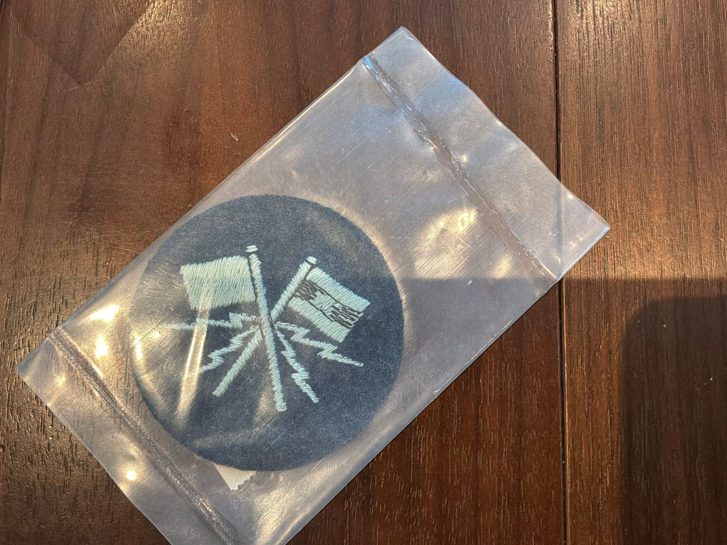 RAF Regiment Signallers trade badge still in original stores packet dated 1973