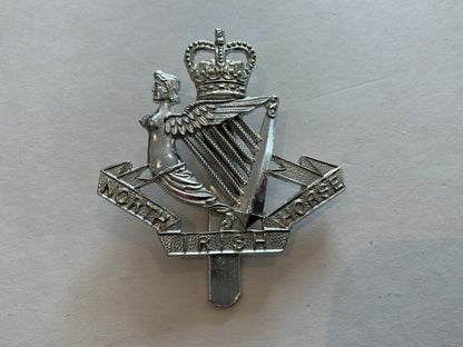 Anodised North Irish Horse cap badge by DOWLER.