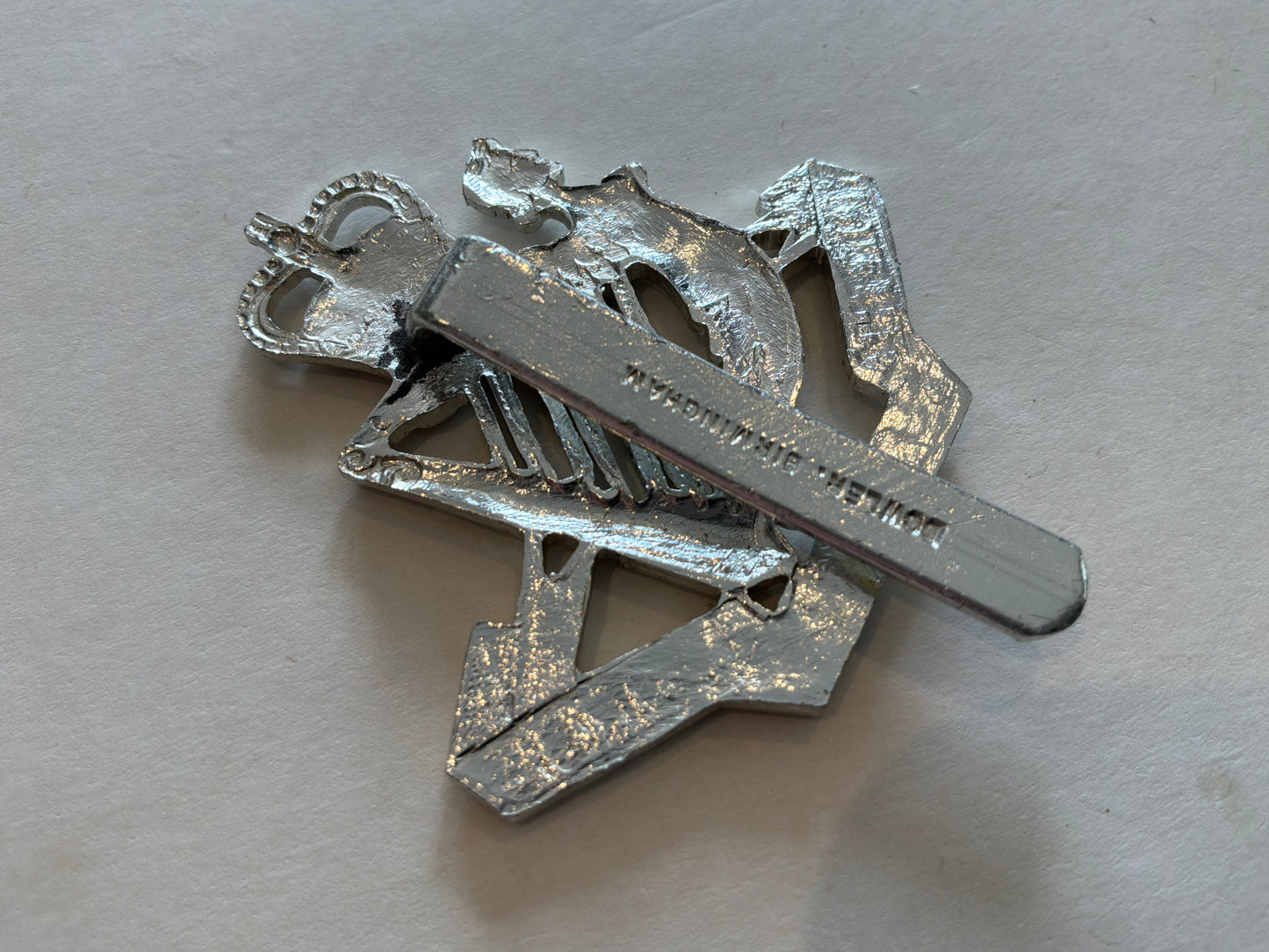 Anodised North Irish Horse cap badge by DOWLER.