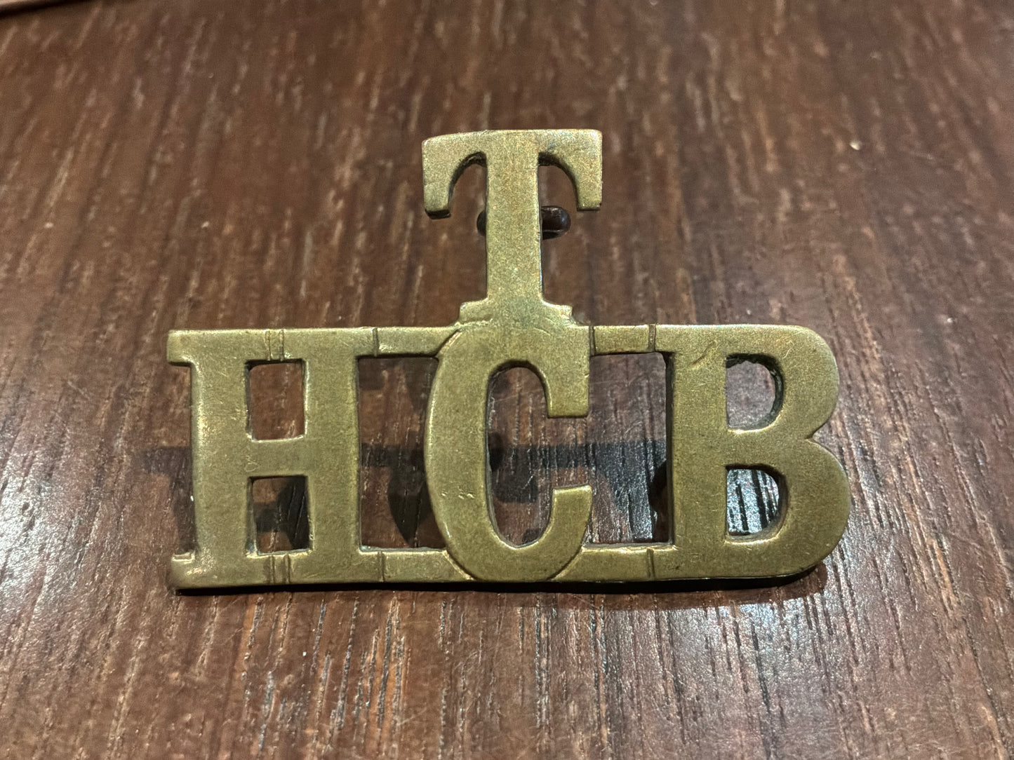 WW1 T/HCB brass title (Highland Cyclist Battalion)